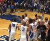 Mike Dade hits a half-court shot to help QHS defeat Chicago Marshall in the finals of the QHS Thanksgiving Tournament