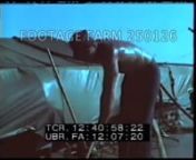 NOTE:to order see:www.footagefarm.co.uk or contact us at:Info@Footagefarm.co.uknShips at anchor, Jun67, USS Harnett County (LST-821) in mouth of Co Chien River, Mekong Delta, Vietnam.Anchored w/ small boats attached to poles.Cu of faces of men in patrol boats, helicopter over river.n00:00:51t12:32:38Titles.Aerials of delta, farm lands, palm treesofficers on shipboardfrom land boats into small channel, US flag flying; past small boat being poled w/ eight or ten people.Passing