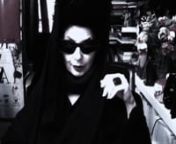 Diane Pernet reading How to Get Rid of Pimples by Cookie Mueller.nn