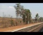 The 2052 Madgaon Cst Jan Shatabdi Express makes it&#39;s aggression felt at Pernem station with dust and pieces of paper flying haywire. It was doing 118.5kph and the speed is from GPS. nVideo by Arzan Kotval