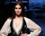 Tara Sutaria lends her glamour as she turns head in a true BOHO look at LFW 2019. Tara closed the shows for veteran designer Ritu Kumar in a true diva form. She wore a short black dress over white full-sleeved blouse. The outfit was layered with long tassels hanging down her either sides of the waist, elevated by knee-length black boots. Tara&#39;s dress was paired with a full sleeves top and thigh-high boots. This was Tara&#39;s first ramp appearance at Lakme Fashion Week. Student Of The Year 2 actress