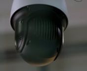 closeup-of-surveillance-video-camera-rotating-arou-2023-11-27-04-53-56-utc from arou