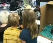 This clip shows kids working in collaborative groups aound the classroom.Some groups create claymation movies with pastilina, others make stop motion using posable figures.Each group created their entire story, script, and sets.Most created their own characters as well.nnAll the videos created are located in the Animation Workshop Folder.