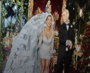Kourtney Kardashian and Travis Barker , Get Married Again in Italy.&#60;br/&#62;A week after getting legally married &#60;br/&#62;in Santa Barbara, California, .&#60;br/&#62;A week after getting legally married &#60;br/&#62;in Santa Barbara, California, .&#60;br/&#62;Kardashian and Barker had a bigger, more lavish ceremony at Castello Brown in Portofino, Italy. .&#60;br/&#62;Kardashian and Barker had a bigger, more lavish ceremony at Castello Brown in Portofino, Italy. .&#60;br/&#62;Kardashian stunned in a &#60;br/&#62;Dolce &amp; Gabbana mini dress...&#60;br/&#62;while Barker rocked a custom black suit &#60;br/&#62;also by Dolce &amp; Gabbana.&#60;br/&#62;The Kardashian-Jenner clan was in attendance... .&#60;br/&#62;... and so were Kourtney &#60;br/&#62;and Travis&#39; respective children.&#60;br/&#62;Other celebs who came to celebrate included Mark Hoppus and Machine Gun Kelly.&#60;br/&#62;Other celebs who came to celebrate included Mark Hoppus and Machine Gun Kelly.&#60;br/&#62;Kourtney changed &#60;br/&#62;into a black dress &#60;br/&#62;for the wedding reception.&#60;br/&#62;Sister Kylie shared a glimpse of the catered Italian dishes available to the guests.&#60;br/&#62;Sister Kylie shared a glimpse of the catered Italian dishes available to the guests.&#60;br/&#62;Sister Kylie shared a glimpse of the catered Italian dishes available to the guests.&#60;br/&#62;Sister Kylie shared a glimpse of the catered Italian dishes available to the guests.&#60;br/&#62;Everyone danced the night away &#60;br/&#62;as DJ Cassidy emceed until 3 a.m.&#60;br/&#62;Everyone danced the night away &#60;br/&#62;as DJ Cassidy emceed until 3 a.m