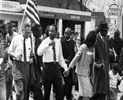 This Day in History:, Selma to Montgomery March Begins.&#60;br/&#62;March 21, 1965.&#60;br/&#62;Led by Dr. Martin Luther King Jr., between 3,000 and &#60;br/&#62;8,000 marchers crossed the Edmund Pettus Bridge &#60;br/&#62;out of Selma on their way to Montgomery.&#60;br/&#62;Over the next five days, they were protected by thousands &#60;br/&#62;of federalized Alabama National Guardsmen and soldiers. &#60;br/&#62;Their numbers would swell to around 25,000.&#60;br/&#62;At the state capitol, King would give his &#60;br/&#62;famous &#92;