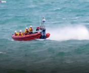 Amazing video footage shows how brave RNLI heroes rescued a stranded humpback whale.