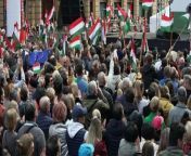 On Hungary&#39;s national day, tens of thousands of people gather at a rally called by Peter Magyar, an emerging critic of long-term Prime Minister Viktor Orban. The PM is facing the biggest political crisis of his 14-year premiership after it emerged that a man convicted in a child sex abuse case had been granted a presidential pardon and was released from jail.