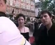 Tom Cruise gets squirted with water through a fake microphone.