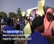 Demonstrators for and against female genital mutilation (FGM) gather outside The Gambia&#39;s National Assembly building as lawmakers vote to advance to the next parliamentary stage a highly controversial bill that seeks to lift a ban on the practice, which has been in place since 2015.