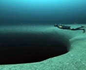 deep diving to a hole in sea