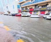 Inundated streets in Sharjah from street school girls