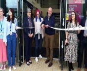 Steve Bent cuts the ribbon to open the new Cancer Research UK shop in Panniers Way, 0akham, with his wife, Sue and store manager Fiona Riley