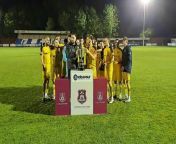 Needham Market celebrate a fourth straight Suffolk Premier Cup success after victory over Felixstowe & Walton United at Bury Town FC from sudbury suffolk