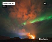 The aurora borealis swayed through the night sky over Iceland on April 6, as a volcano erupted, creating a very unique scene.