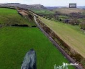 A team of 10 artists took three days to paint a gigantic painting on a green pasture in Hebden Bridge, England, to remind voters to consider the environment when casting their votes this year.