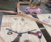 This father-daughter duo was working at the workshop when the daughter accidentally hit her father&#39;s thumb while nailing a screw with a hammer. The father suppressed his pain, controlled himself from cussing, and continued with the work.