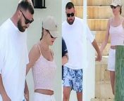 In a picturesque moment captured during their romantic getaway on the 27th of March, 2024, Taylor Swift and Travis Kelce were spotted strolling hand in hand, their connection palpable to onlookers and fans alike. However, what caught the attention of many was the unique way in which Swift and Kelce were linked—not by mere handholding, but by handcuffs.&#60;br/&#62;&#60;br/&#62;The sight of Swift and Kelce walking together, their hands bound by handcuffs, symbolized a bond that seemed unbreakable, a commitment to stay connected and united through every step of their journey. Swift&#39;s hand, interlocked with Kelce&#39;s, conveyed a sense of trust, intimacy, and a shared sense of adventure.&#60;br/&#62;&#60;br/&#62;The image captured the essence of their relationship—a union built on trust, love, and a willingness to embrace life&#39;s adventures together. As they walked side by side, Swift and Kelce appeared completely at ease, their connection evident in every stride.&#60;br/&#62;&#60;br/&#62;For fans of Taylor Swift and Travis Kelce, this moment served as a reminder of the depth of their bond and the strength of their relationship. It was a touching display of affection that resonated with many, sparking admiration and affection from fans around the world.&#60;br/&#62;&#60;br/&#62;To stay updated on all the latest moments and developments in the lives of Taylor Swift and Travis Kelce, be sure to subscribe to our channel. Don&#39;t miss out on any of the heartwarming moments and exciting updates from this dynamic duo—subscribe now and join us for more exclusive content!